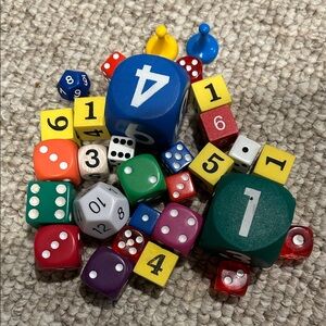 Colorful Dice and Game Pieces Set